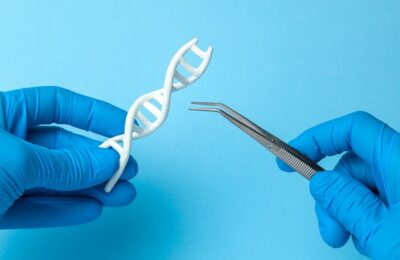 DNA helix research. Concept of genetic experiments on human biological code DNA. Scientist holding DNA helix and tweezers