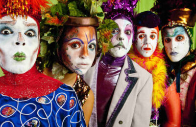 Clowns wearing theatrical makeup